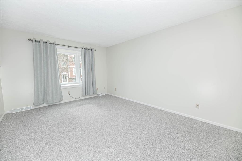 149 Canterbury Commons Indiana, PA 15701 - Photo 8 of 9 a view of an empty room with a window