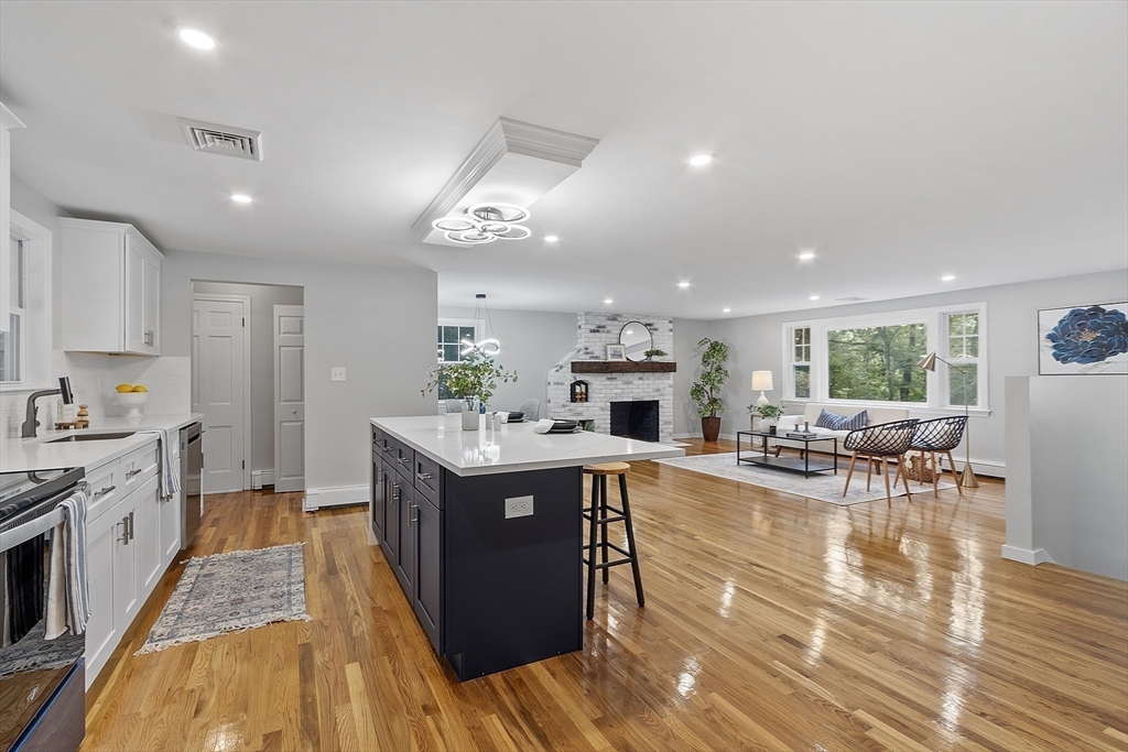 167 Harvard Road Stow, MA 01775 - Photo 12 of 27 a kitchen with sink cabinets and view of living room