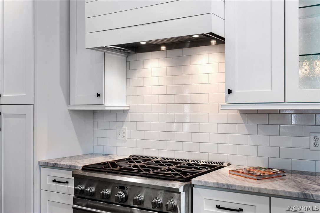 3703 Custis Road Richmond, VA 23225 - Photo 12 of 33 a stove top oven sitting inside of a kitchen