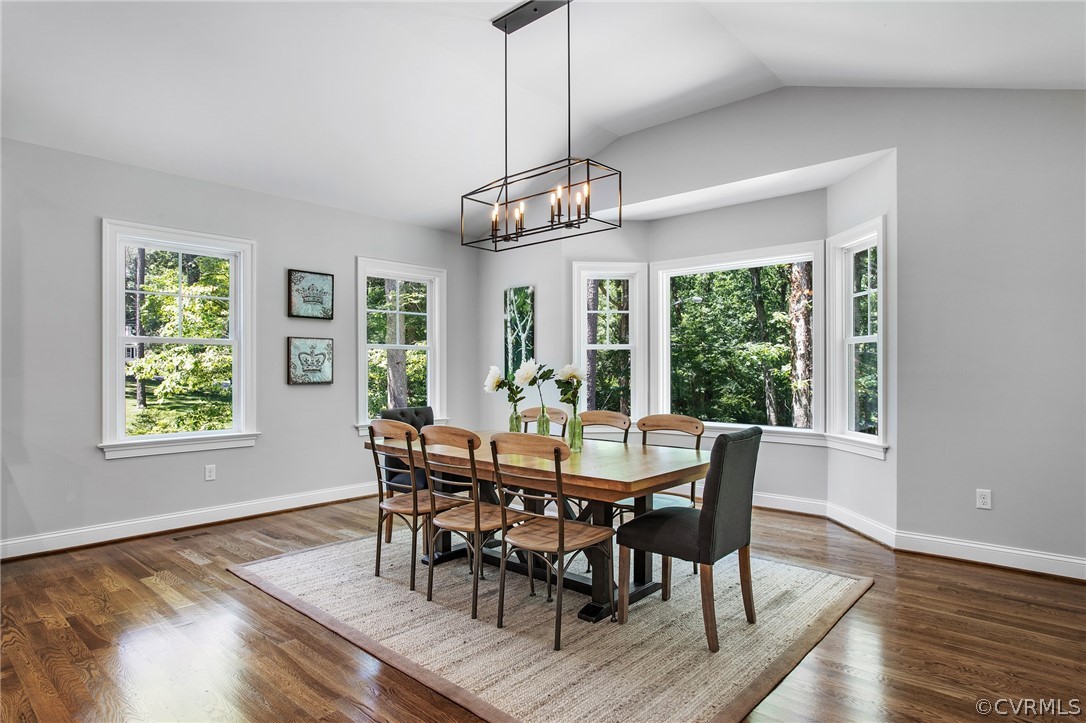 3703 Custis Road Richmond, VA 23225 - Photo 15 of 33 a view of a dining room with furniture window and wooden floor
