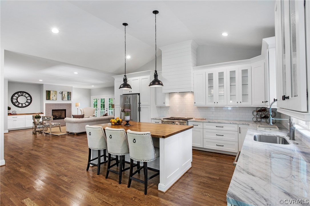 3703 Custis Road Richmond, VA 23225 - Photo 10 of 33 a large kitchen with lots of counter space and stainless steel appliances