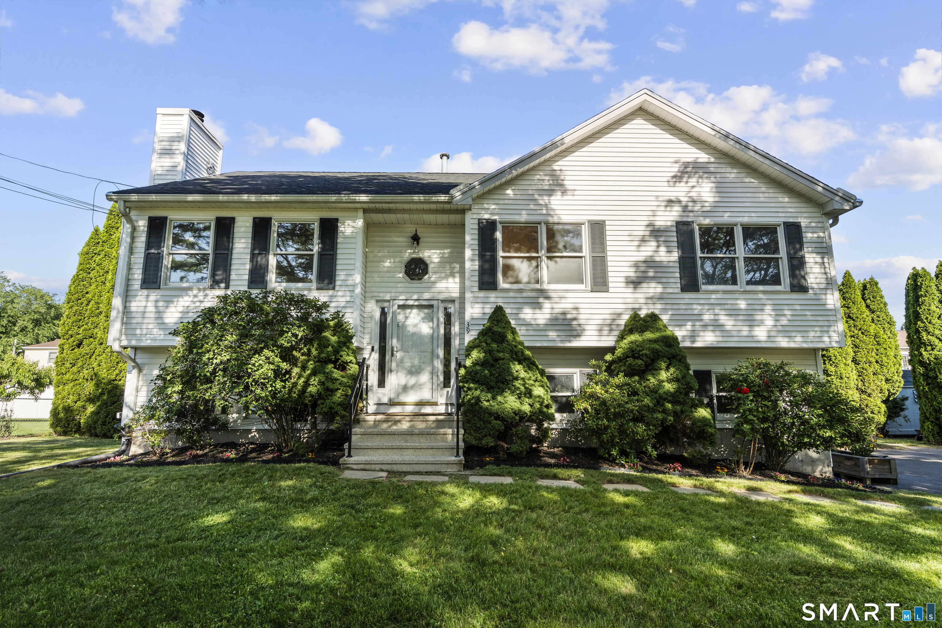39 Joseph Lane Hamden, CT 06514 - Photo 2 of 40 a front view of house with yard and green space