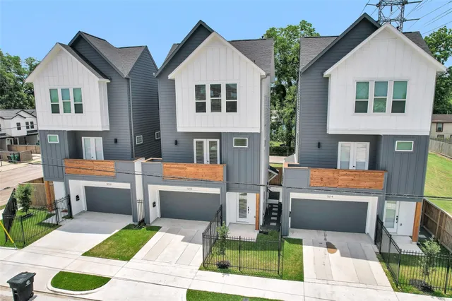 a front view of house with yard and seating