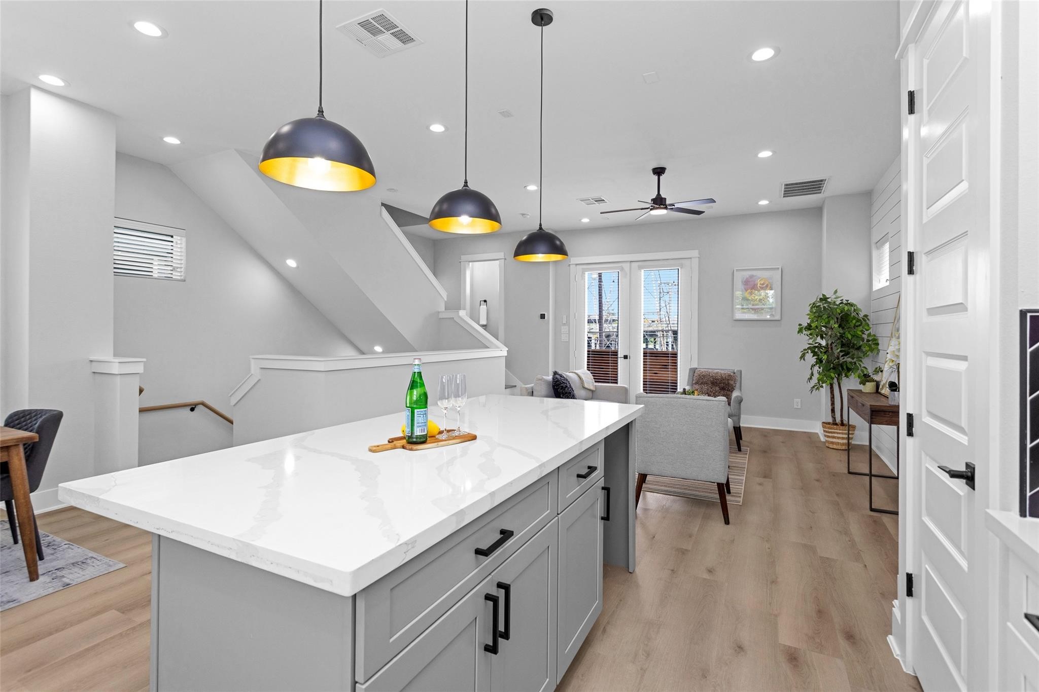1616 Euel Street Houston, TX 77009 - Photo 17 of 42 a kitchen with a sink a counter and chairs
