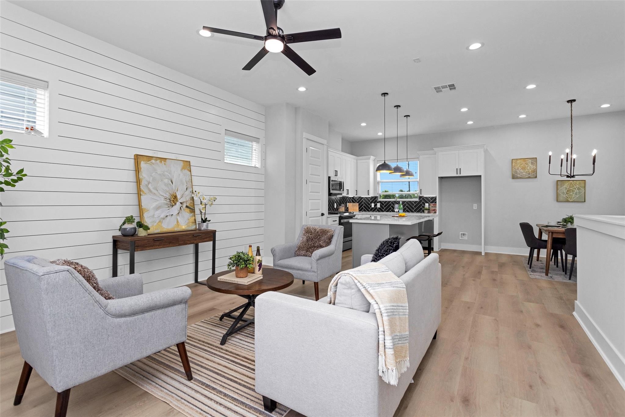 1616 Euel Street Houston, TX 77009 - Photo 19 of 42 a living room with furniture and kitchen view