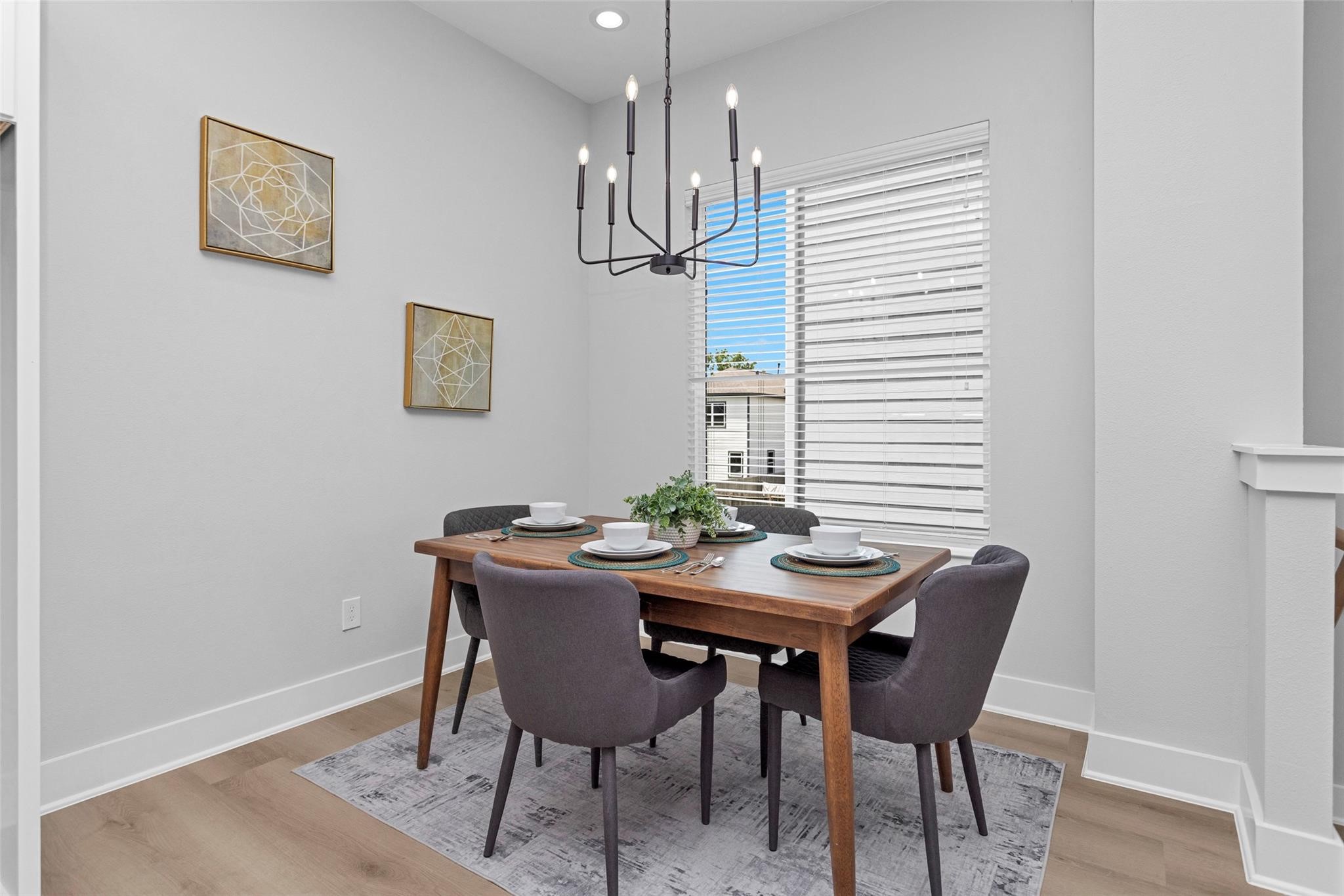 1616 Euel Street Houston, TX 77009 - Photo 23 of 42 a view of a dining room with furniture and chandelier