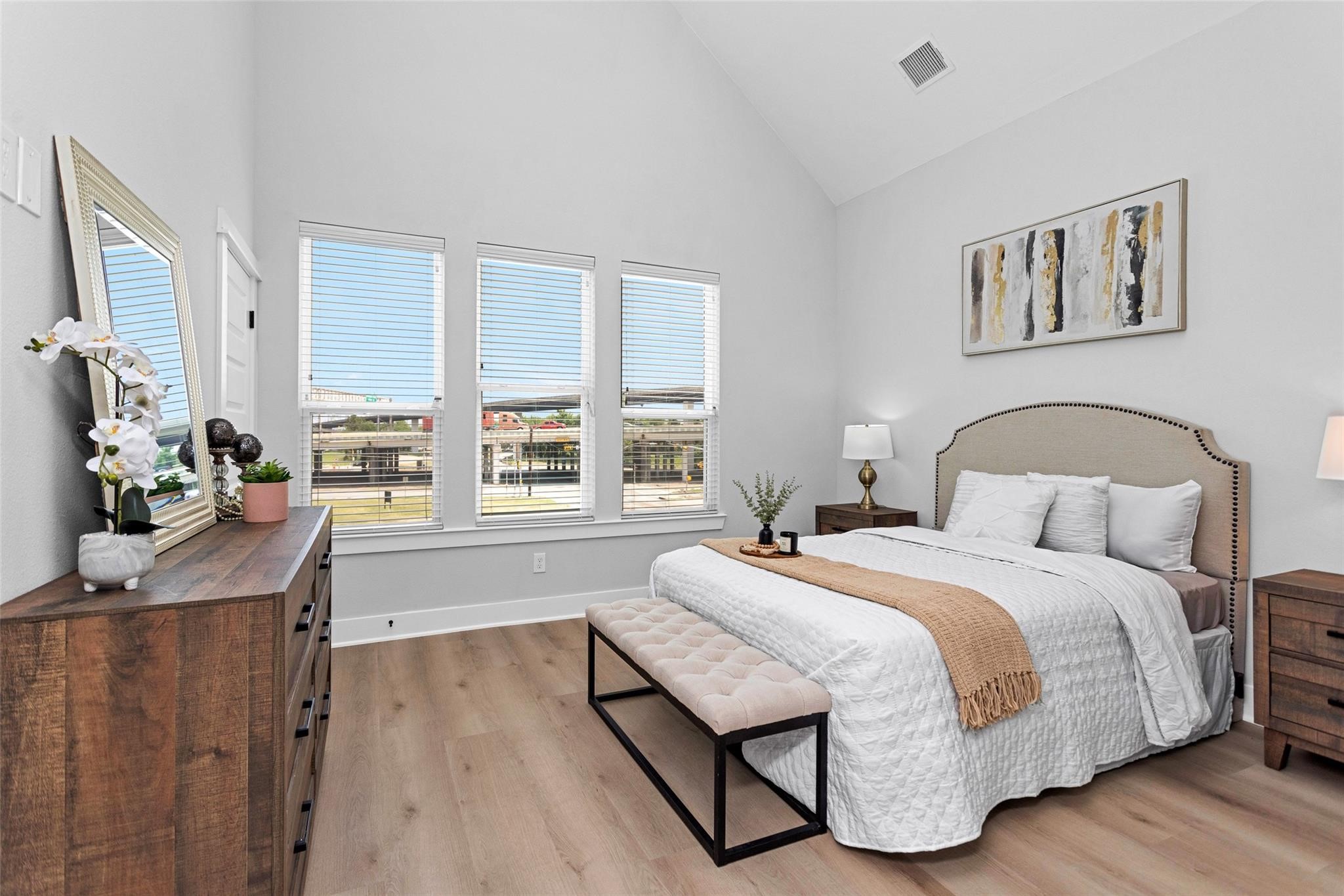 1616 Euel Street Houston, TX 77009 - Photo 32 of 42 a bedroom with a bed table and a window