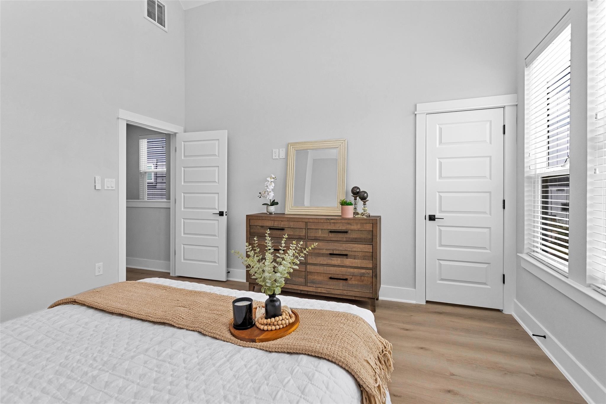 1616 Euel Street Houston, TX 77009 - Photo 34 of 42 a bedroom with a bed and a dresser