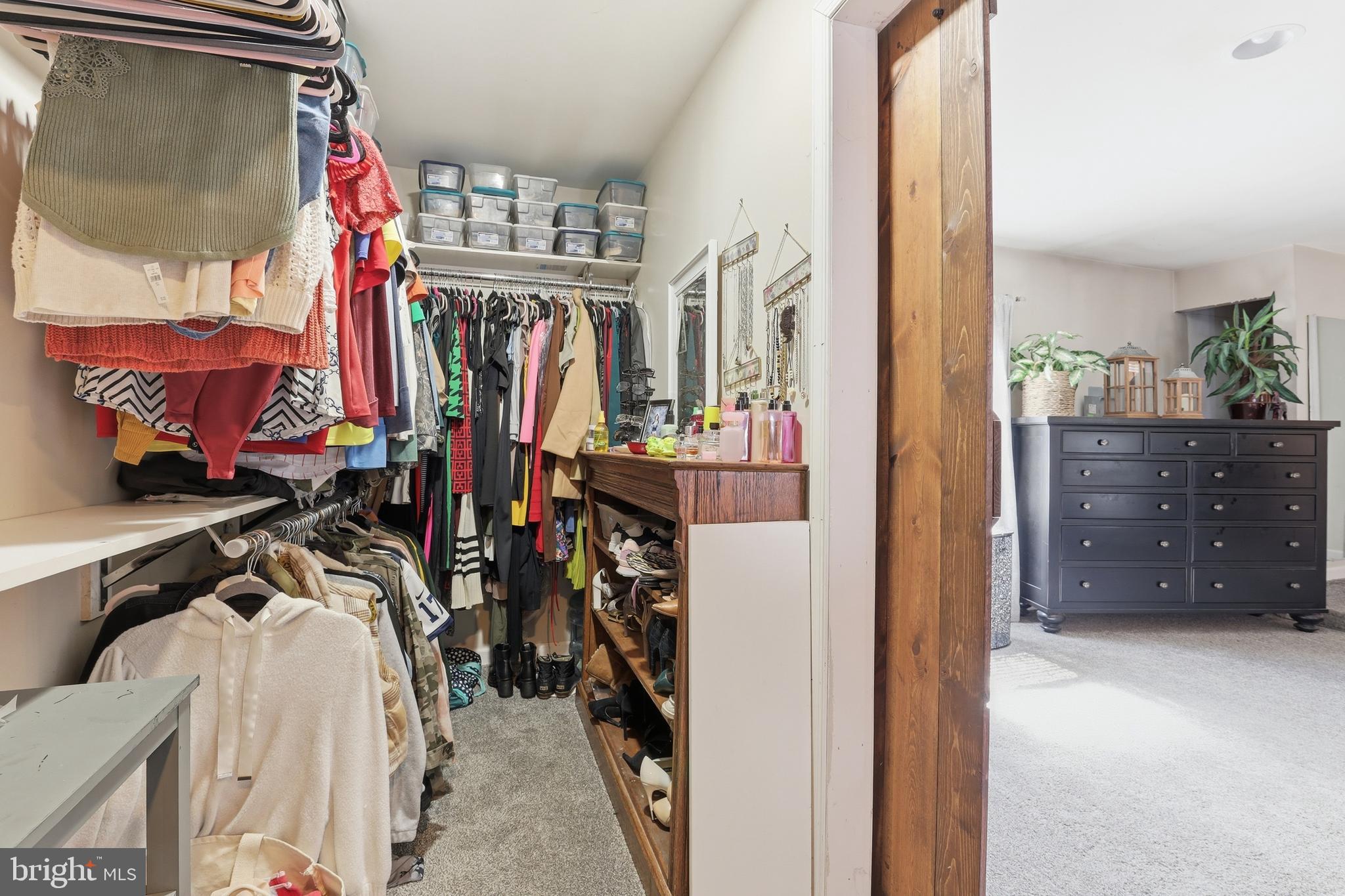 11326 Shawnee Road Greenwood, DE 19950 - Photo 25 of 57 a view of walk in closet with clothes