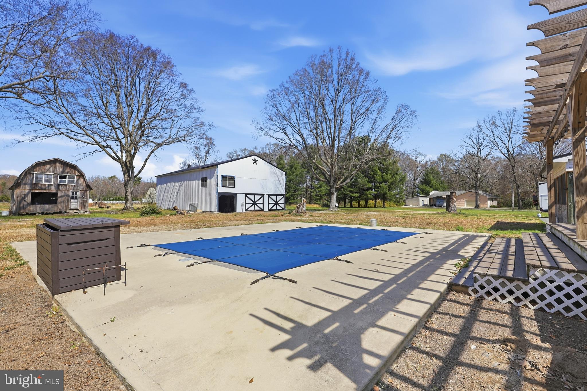 11326 Shawnee Road Greenwood, DE 19950 - Photo 35 of 57 a view of swimming pool with sitting area