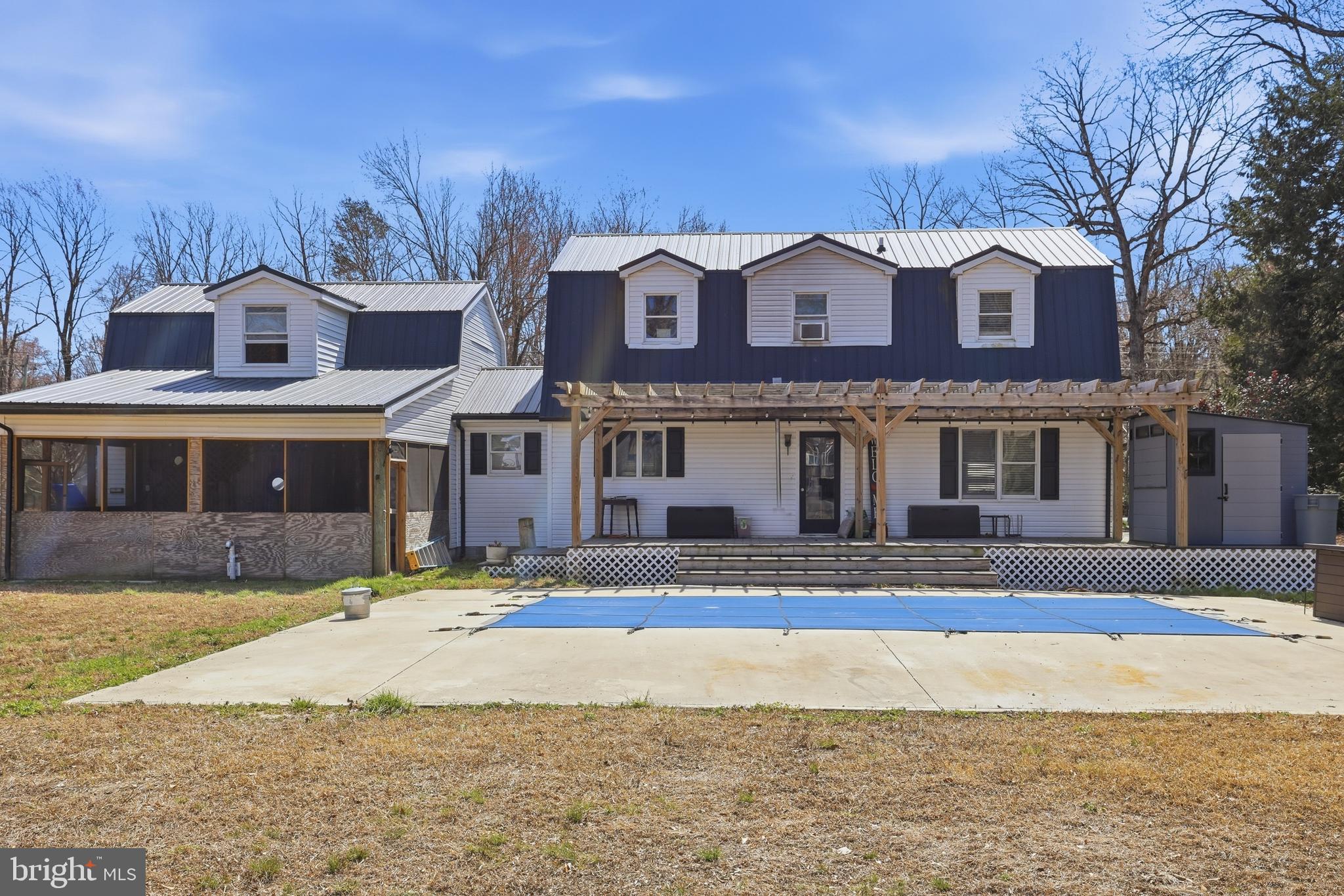 11326 Shawnee Road Greenwood, DE 19950 - Photo 44 of 57 a view of a house with a swimming pool