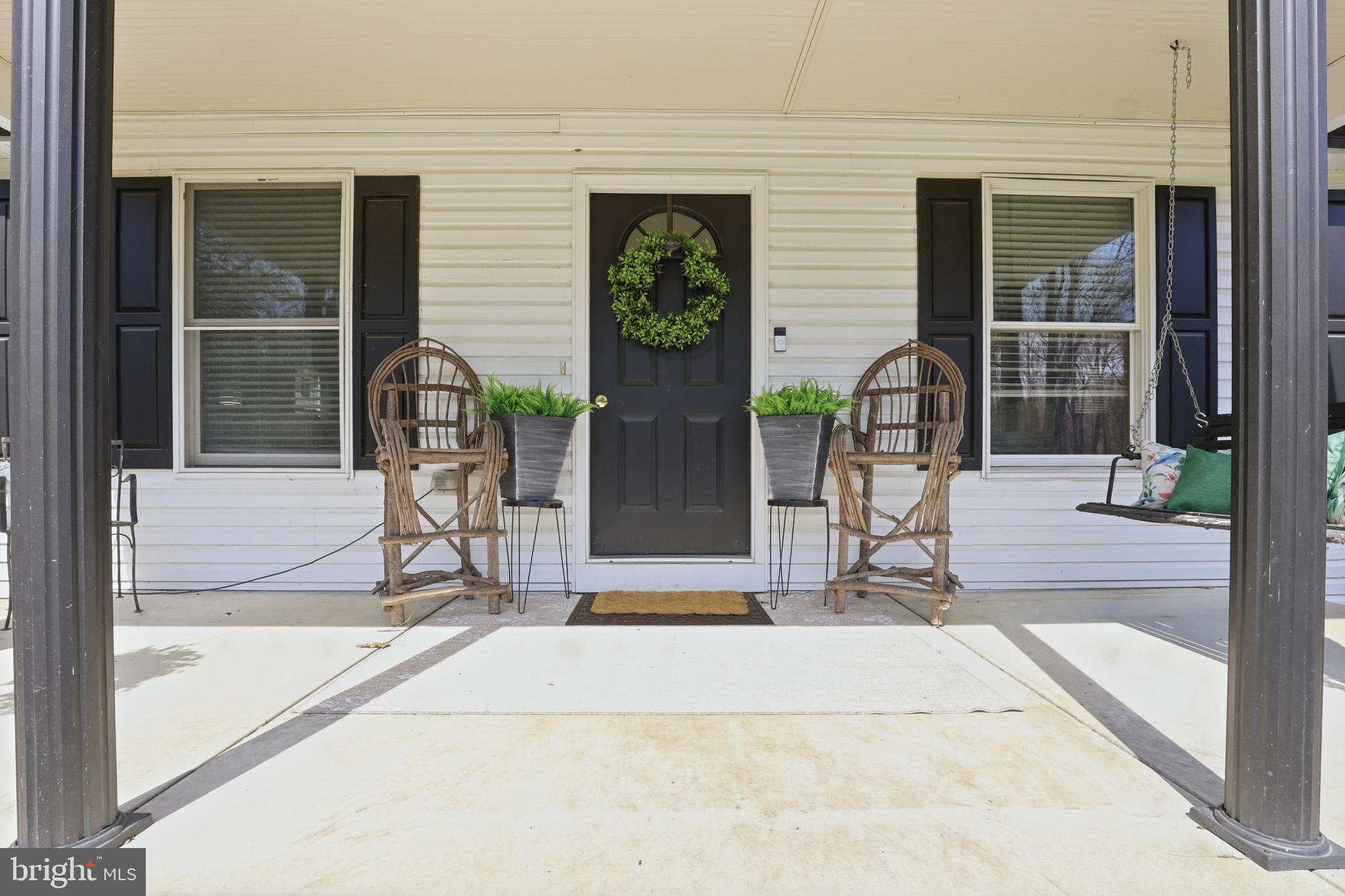 11326 Shawnee Road Greenwood, DE 19950 - Photo 7 of 57 a view of a entryway door front of house