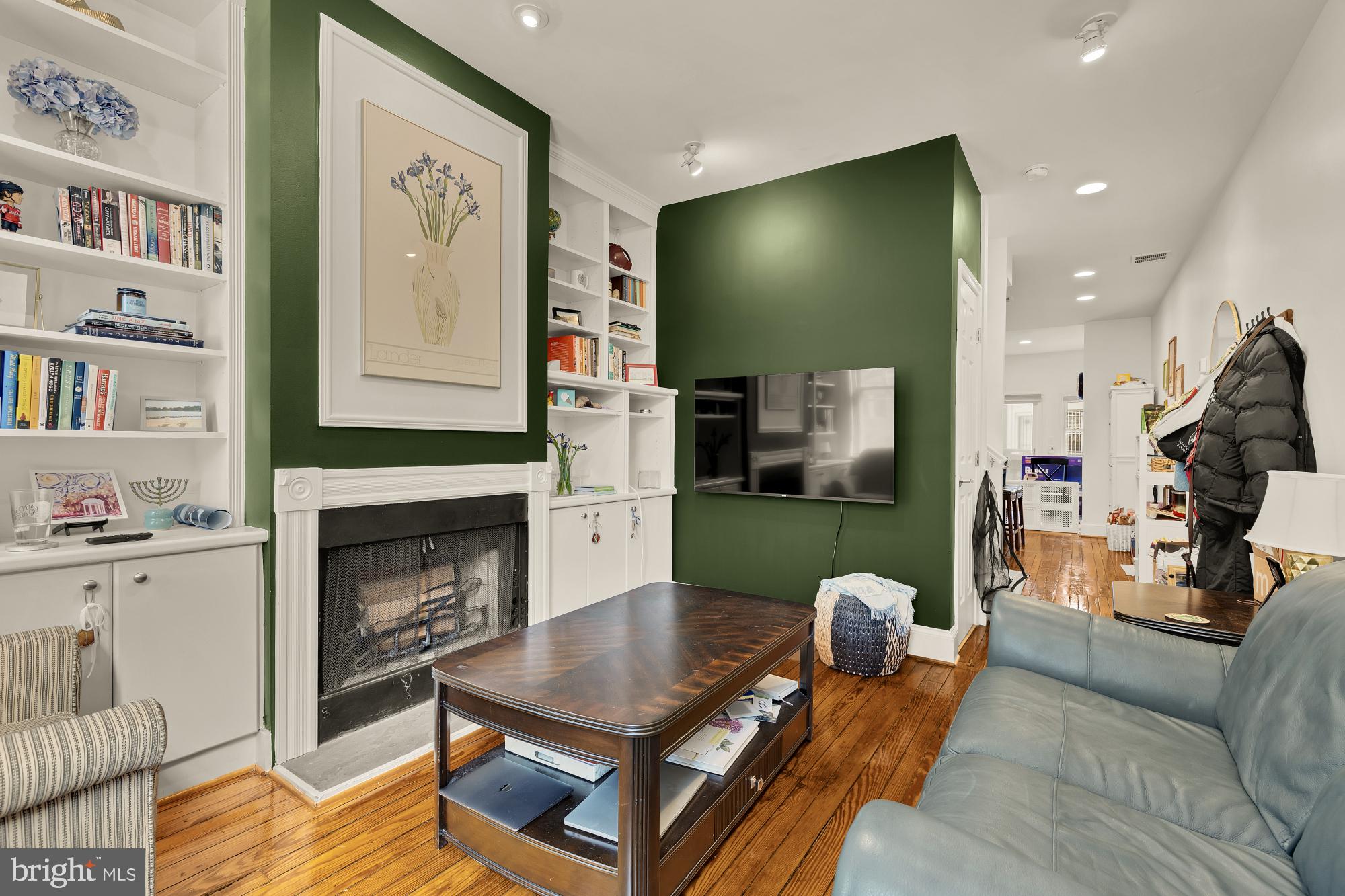 1905 17th Street Northwest Washington, DC 20009 - Photo 3 of 34 Gorgeous family room with fireplace, built-ins