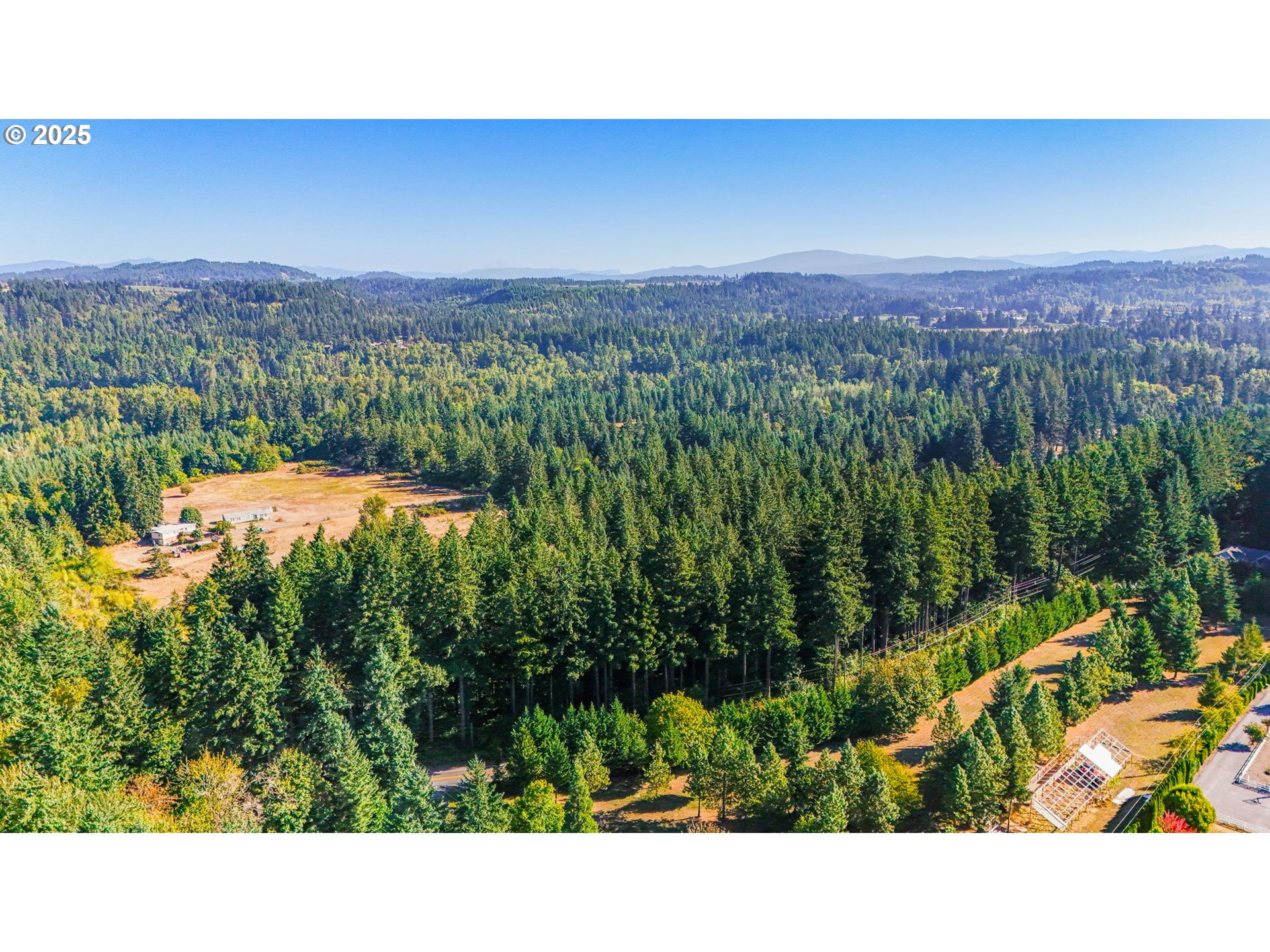 0 South Latourette Road Oregon City, OR 97045 - Photo 6 of 33 a view of a city with lush green forest