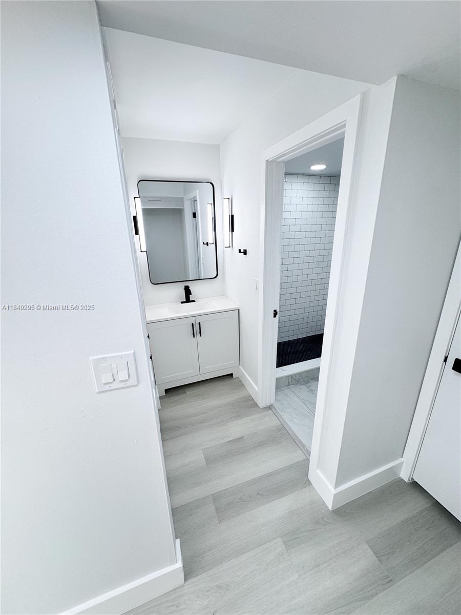 3660 Inverrary Drive, Unit 1Y Lauderhill, FL 33319 - Photo 17 of 24 a view of a hallway with entryway