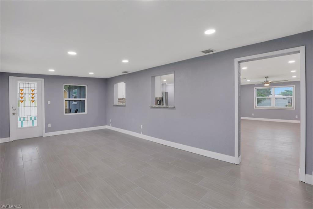 19109 Birch Road Fort Myers, FL 33967 - Photo 11 of 24 an empty room with windows and closet