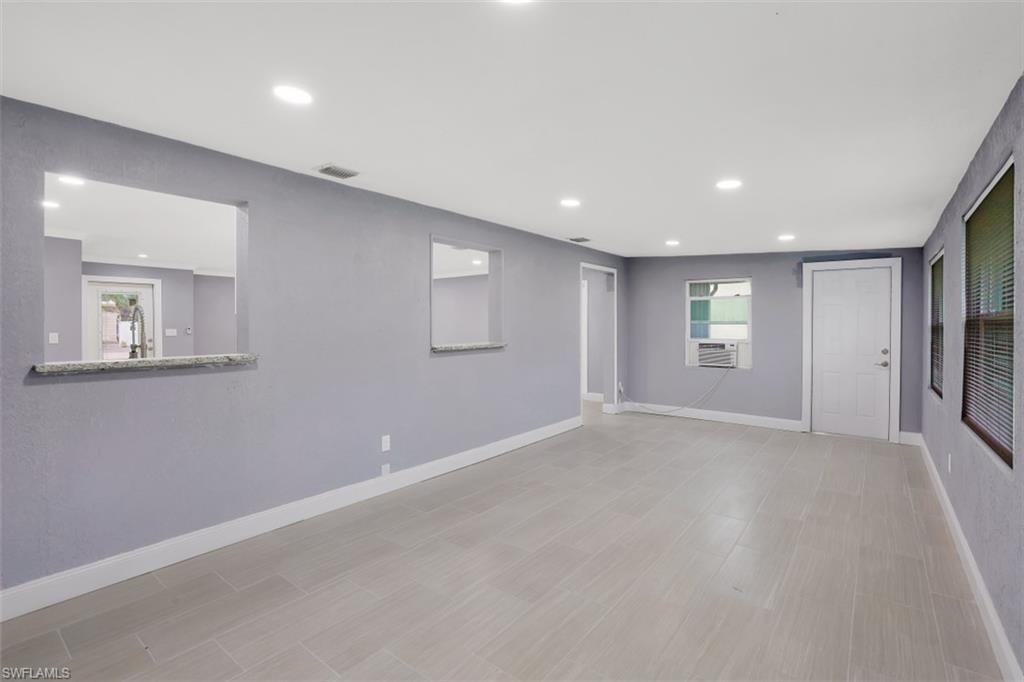 19109 Birch Road Fort Myers, FL 33967 - Photo 12 of 24 an empty room with windows and closet