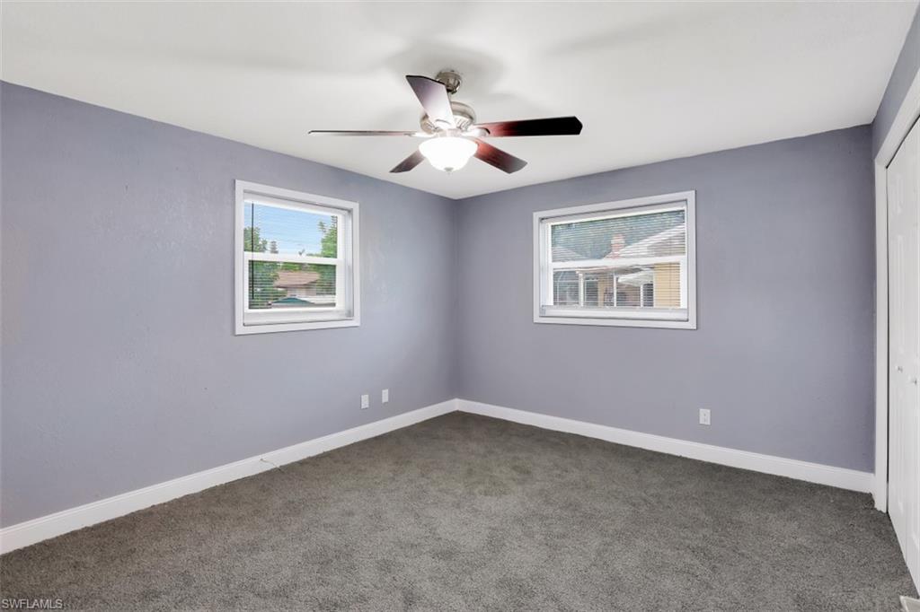 19109 Birch Road Fort Myers, FL 33967 - Photo 14 of 24 a view of an empty room with a window