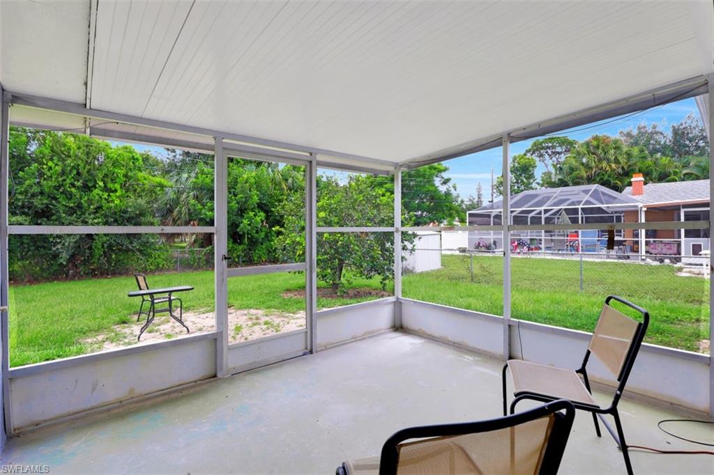 19109 Birch Road Fort Myers, FL 33967 - Photo 23 of 24 a view of a house with backyard and porch
