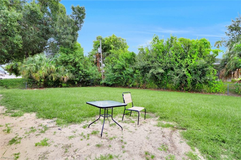 19109 Birch Road Fort Myers, FL 33967 - Photo 24 of 24 a view of a chairs with a backyard