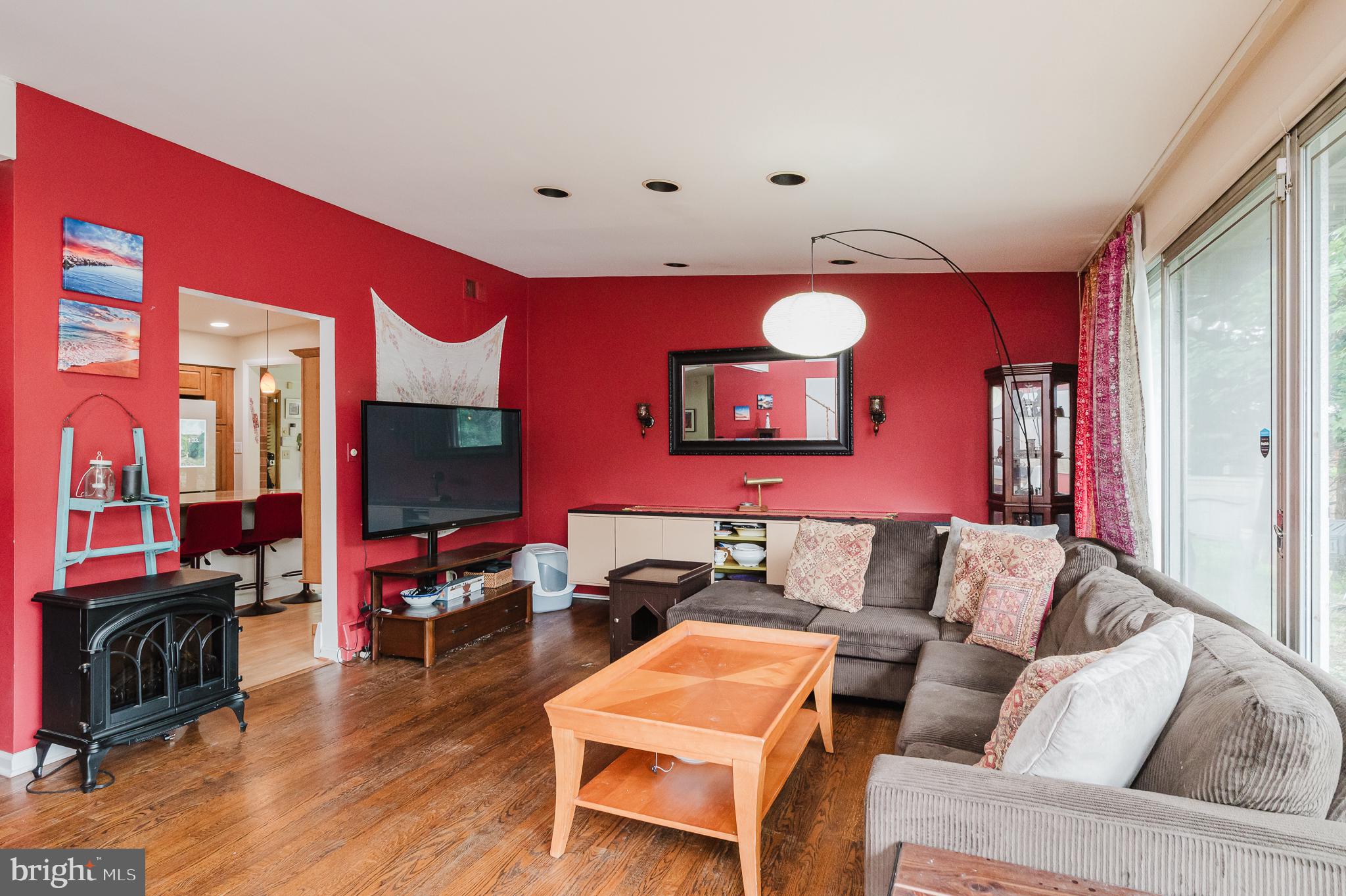 3228 Midfield Road Pikesville, MD 21208 - Photo 16 of 42 Vibrant living space with cozy charm.