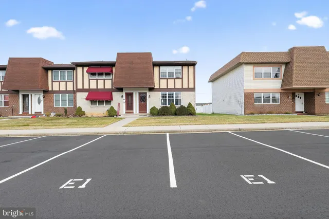 a view of a house with a swimming pool
