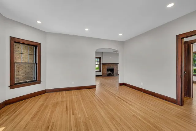 a view of livingroom with hardwood floor and a ceiling fan