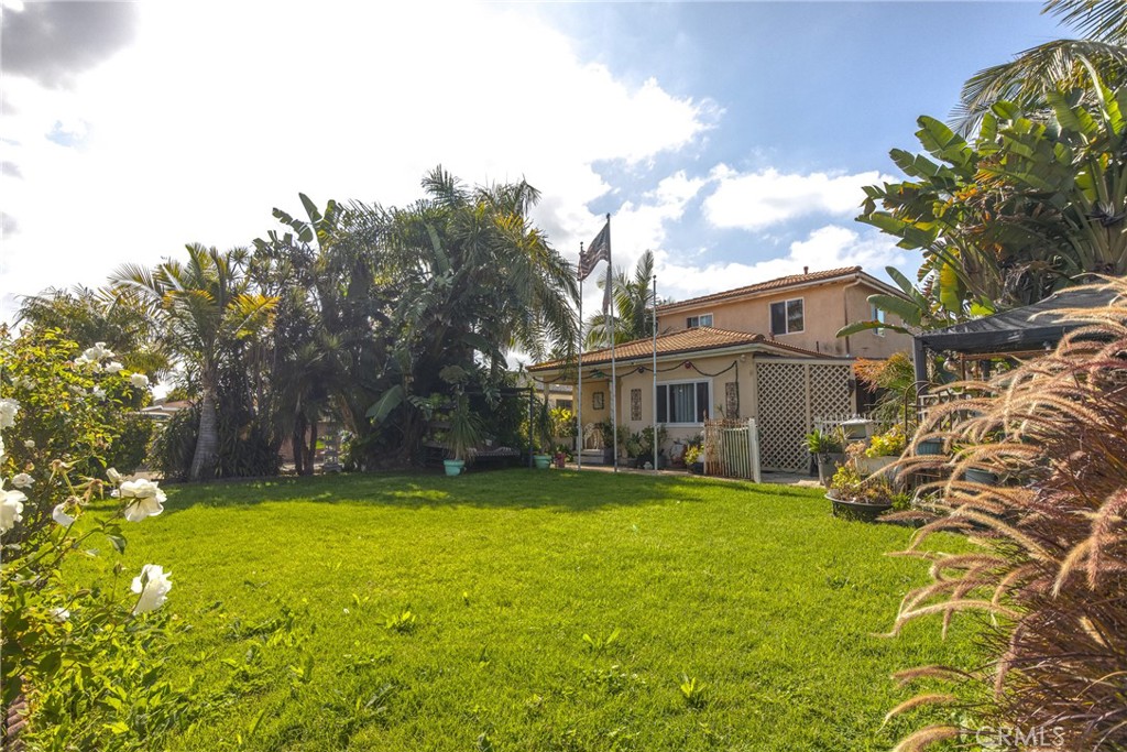 1302 West 132nd Street Compton, CA 90222 - Photo 3 of 10 a view of a yard in front of house