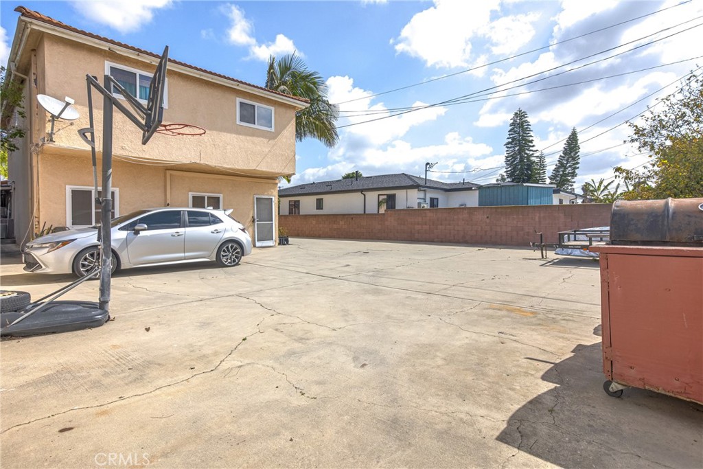 1302 West 132nd Street Compton, CA 90222 - Photo 7 of 10 a view of a street with cars