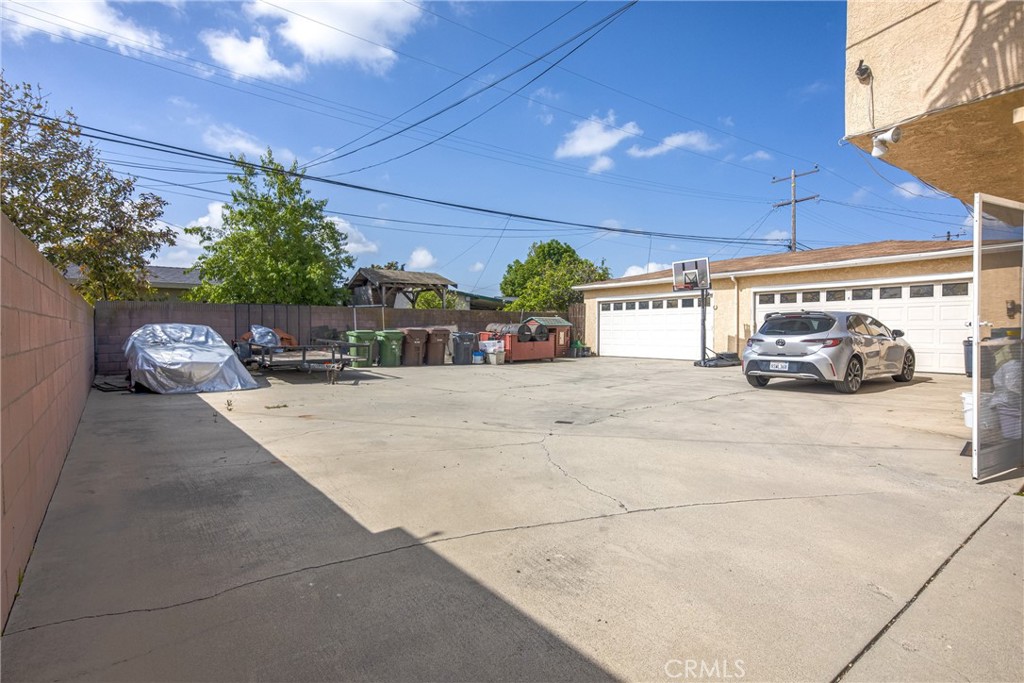 1302 West 132nd Street Compton, CA 90222 - Photo 8 of 10 a view of a street with cars