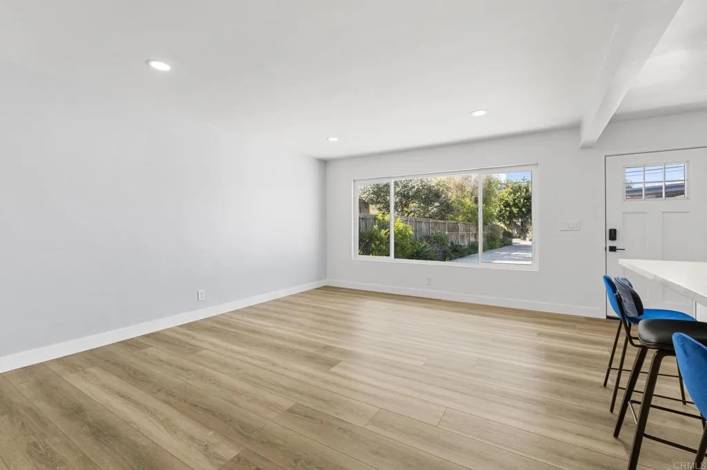 1153 Aloha Drive Encinitas, CA 92024 - Photo 28 of 50 a view of room with window and wooden floor