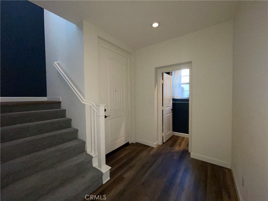 22083 Propello Drive Saugus, CA 91350 - Photo 2 of 21 a view of entryway with wooden floor and stairs