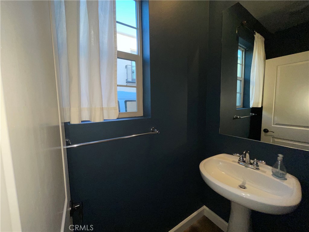 22083 Propello Drive Saugus, CA 91350 - Photo 4 of 21 a bathroom with a sink and a mirror