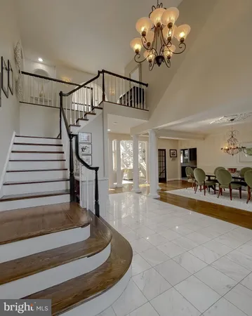a view of a dining room with furniture and window