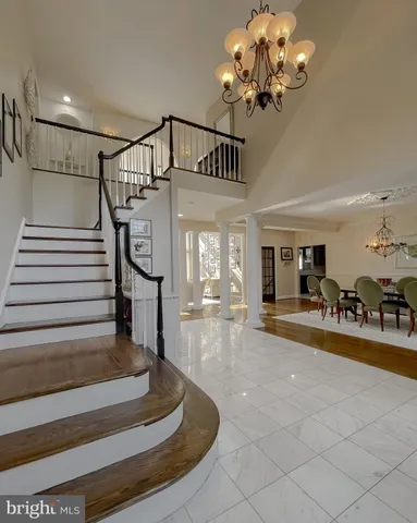 a view of a dining room with furniture and window
