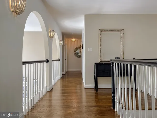 a view of a livingroom with furniture and a flat screen tv
