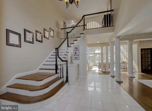 a view of a dining room with furniture and window