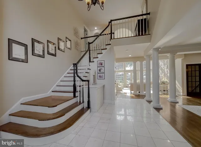 a view of a dining room with furniture and window