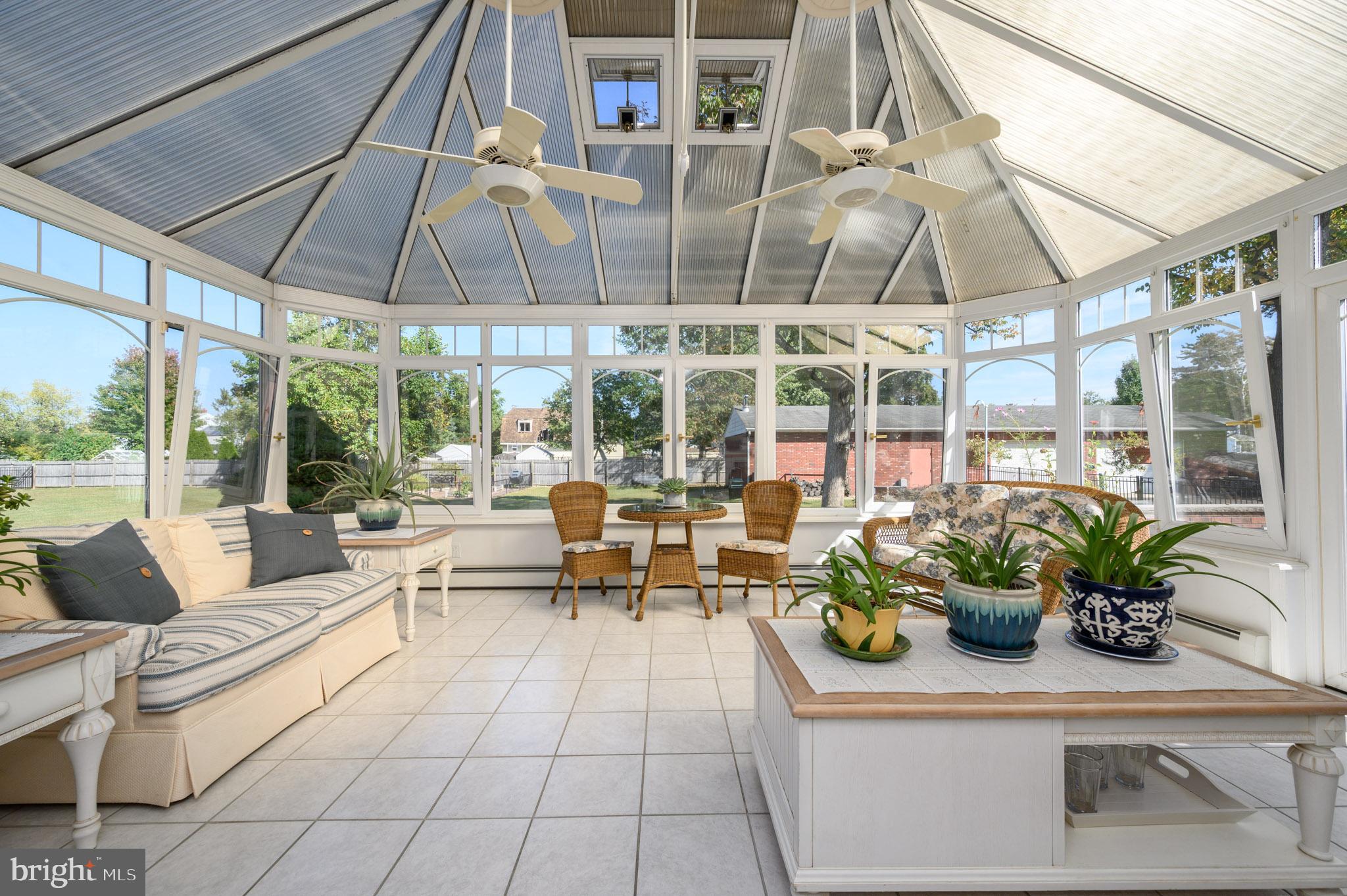 1404 Columbus Road Burlington, NJ 08016 - Photo 18 of 55 a view of a patio with a table and chairs under an umbrella