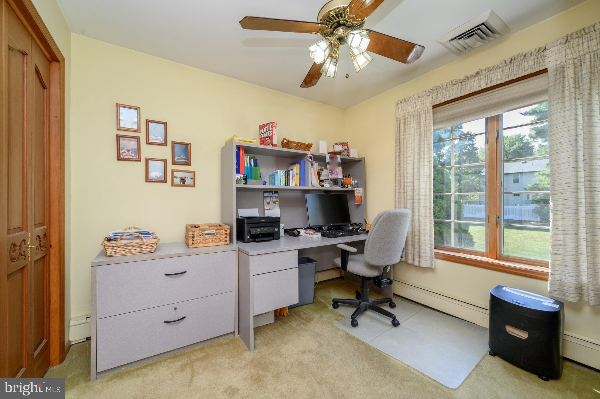1404 Columbus Road Burlington, NJ 08016 - Photo 21 of 55 a view of a workspace with furniture and a window