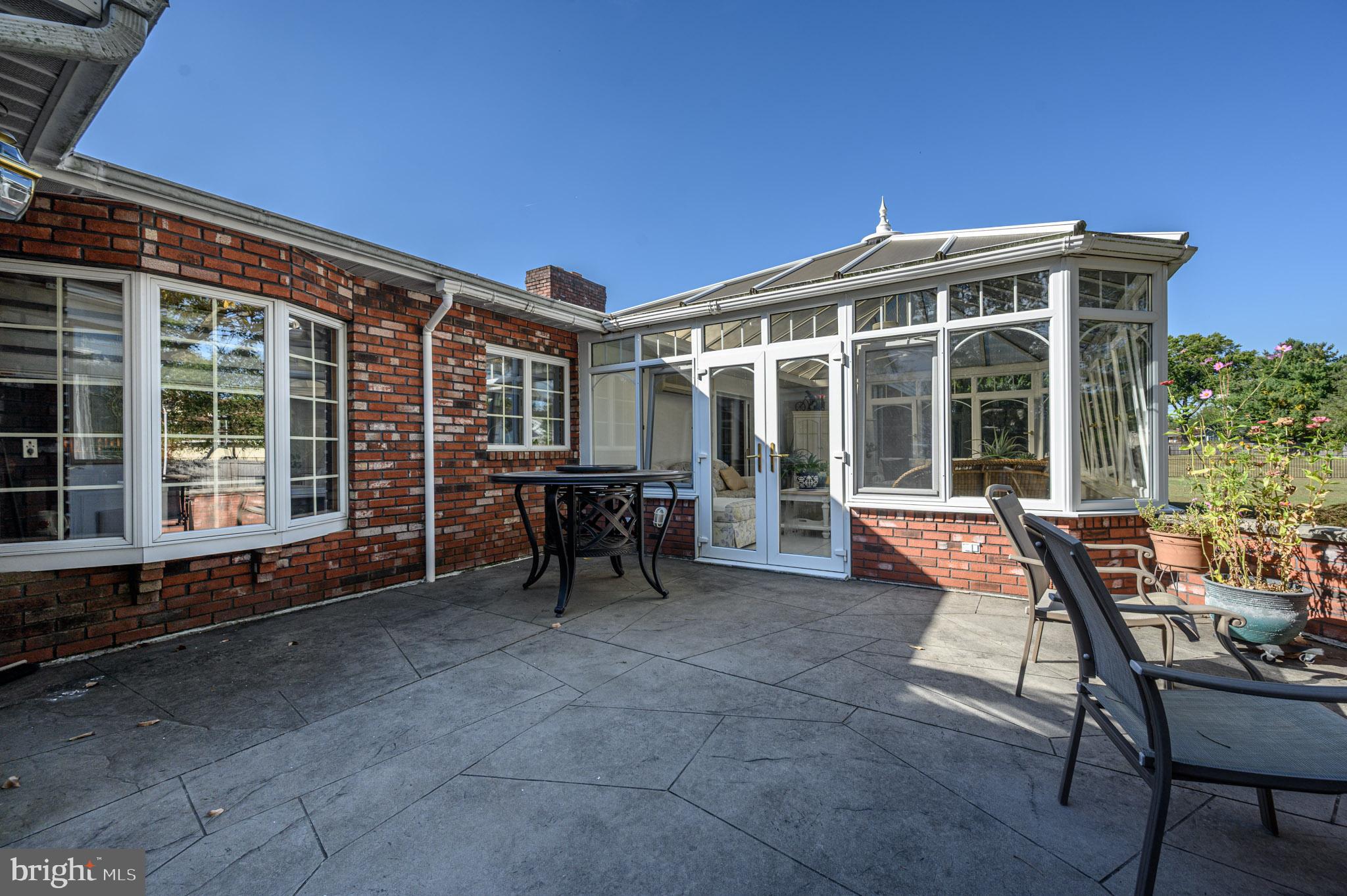 1404 Columbus Road Burlington, NJ 08016 - Photo 42 of 55 a view of a house with backyard sitting area and garden