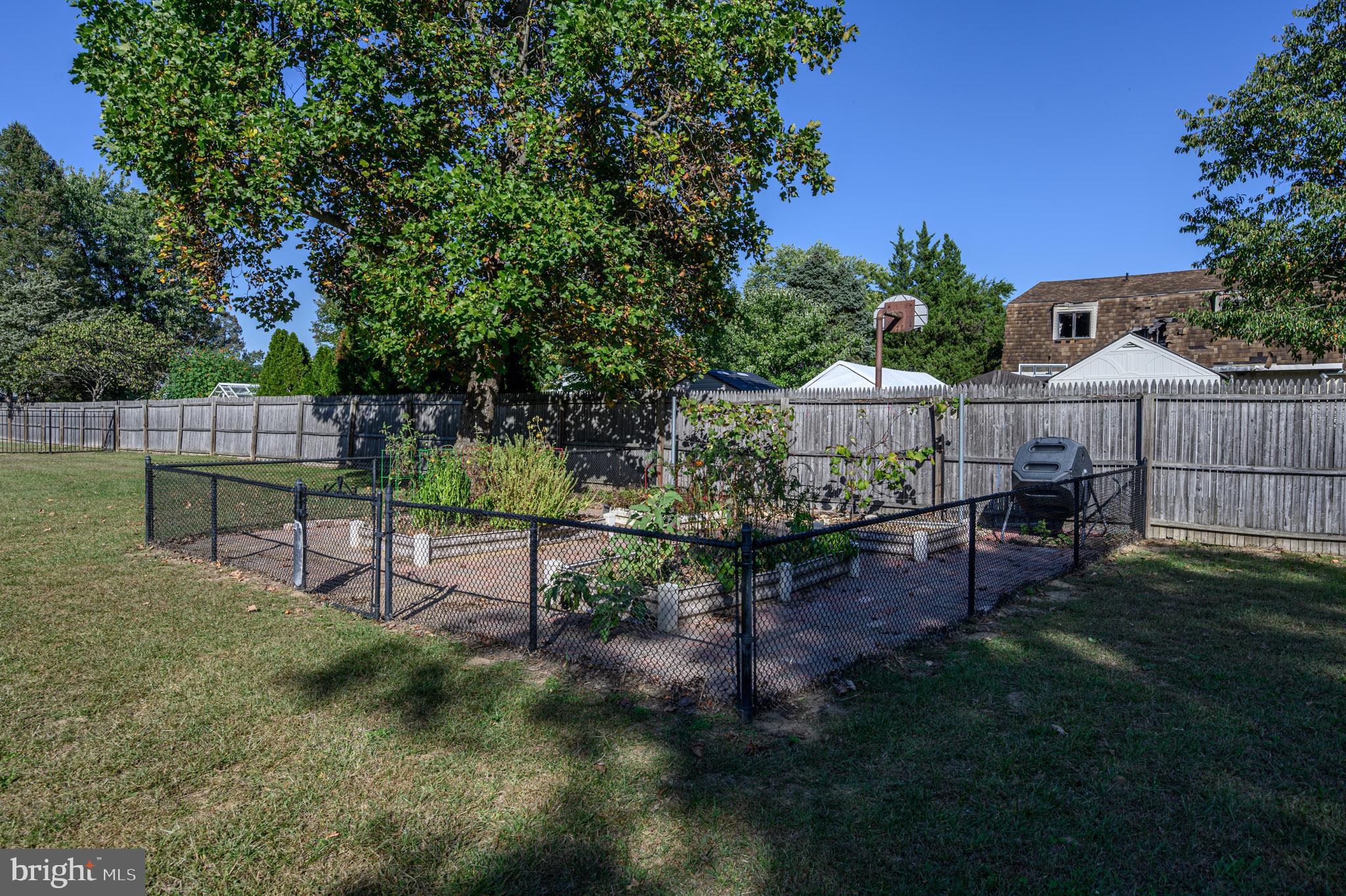 1404 Columbus Road Burlington, NJ 08016 - Photo 46 of 55 a view of a bench in a backyard