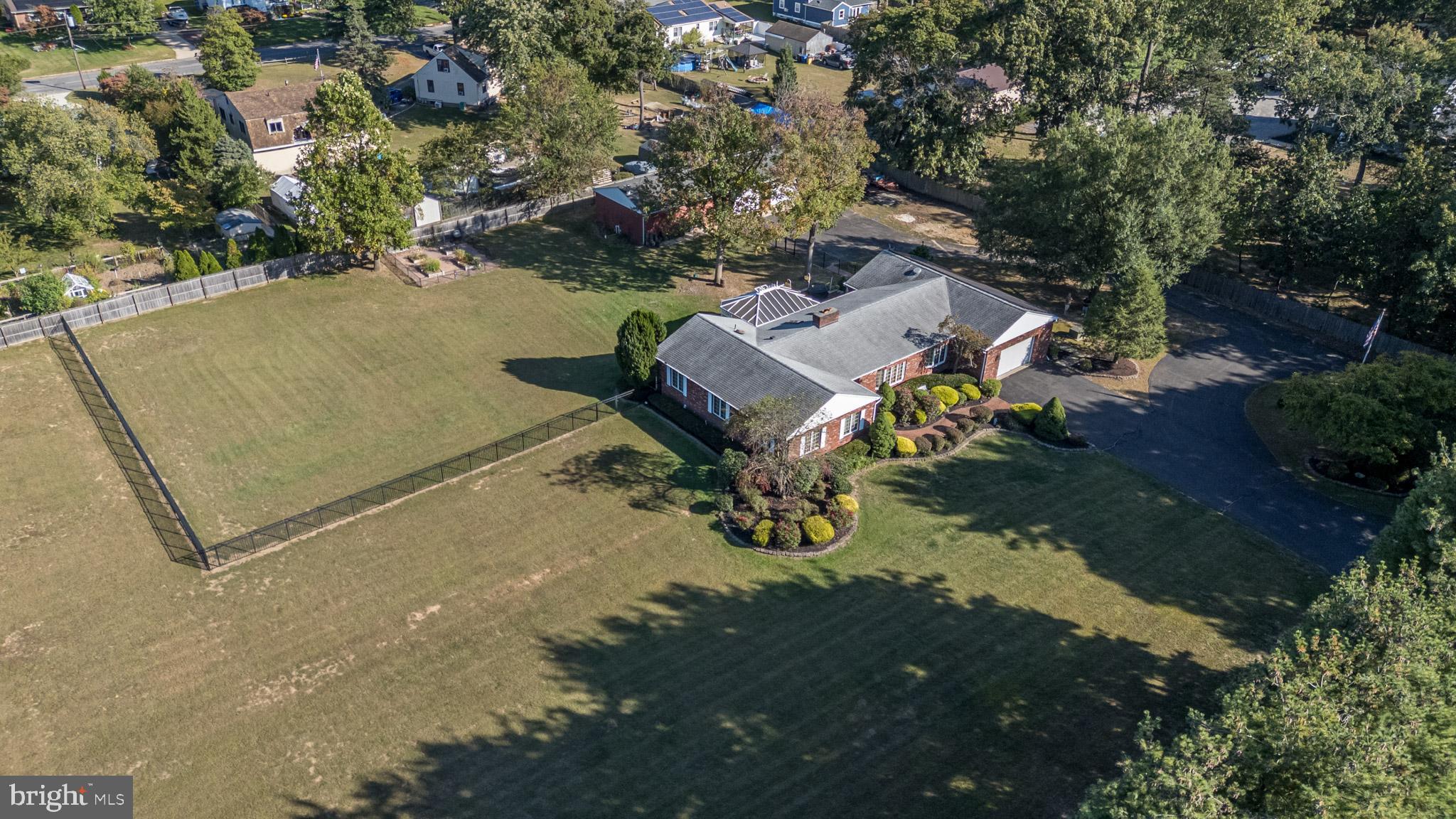 1404 Columbus Road Burlington, NJ 08016 - Photo 52 of 55 an aerial view of a house with yard swimming pool and lake view