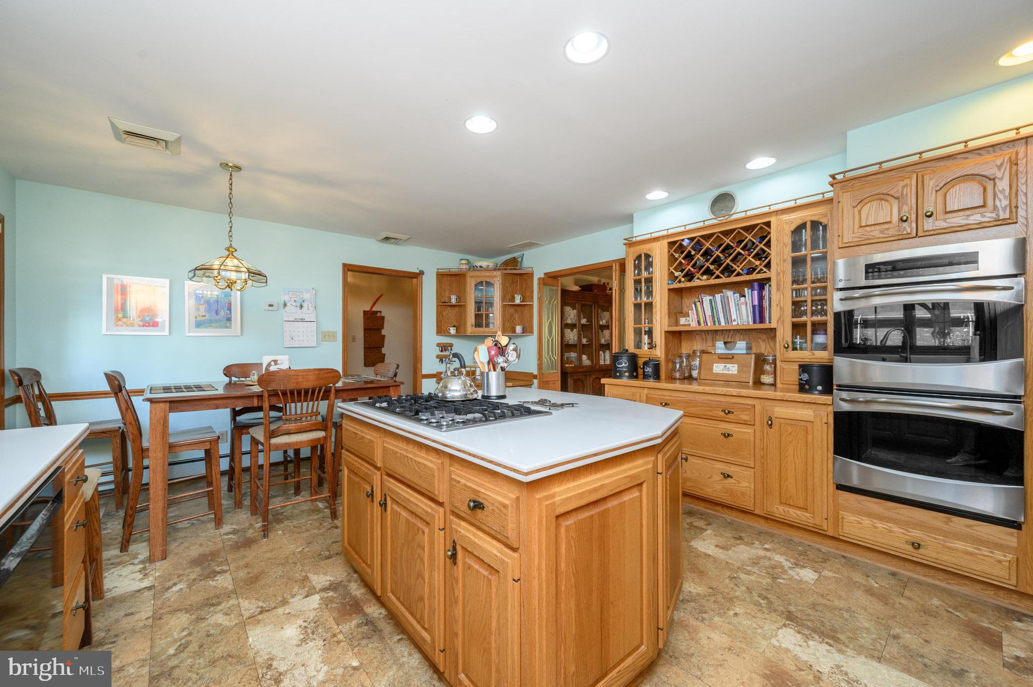1404 Columbus Road Burlington, NJ 08016 - Photo 10 of 55 a kitchen with stainless steel appliances granite countertop a stove and a refrigerator