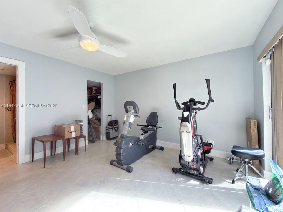 205 Bonnie Brae Way, Unit 33 Hollywood, FL 33021 - Photo 15 of 43 a view of a room with gym equipment