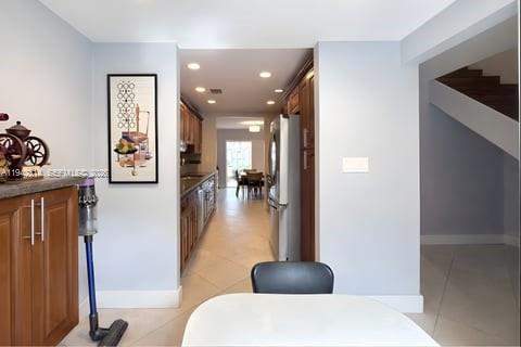 205 Bonnie Brae Way, Unit 33 Hollywood, FL 33021 - Photo 7 of 43 a lobby with furniture and a potted plant