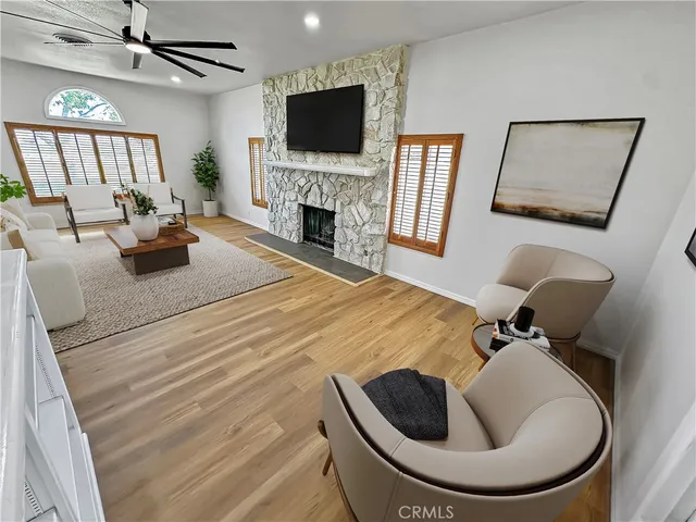 a room with furniture and a fireplace