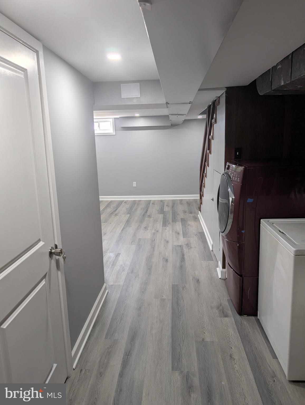 3011 Larue Square East Baltimore, MD 21225 - Photo 12 of 19 a view of empty room with wooden floor
