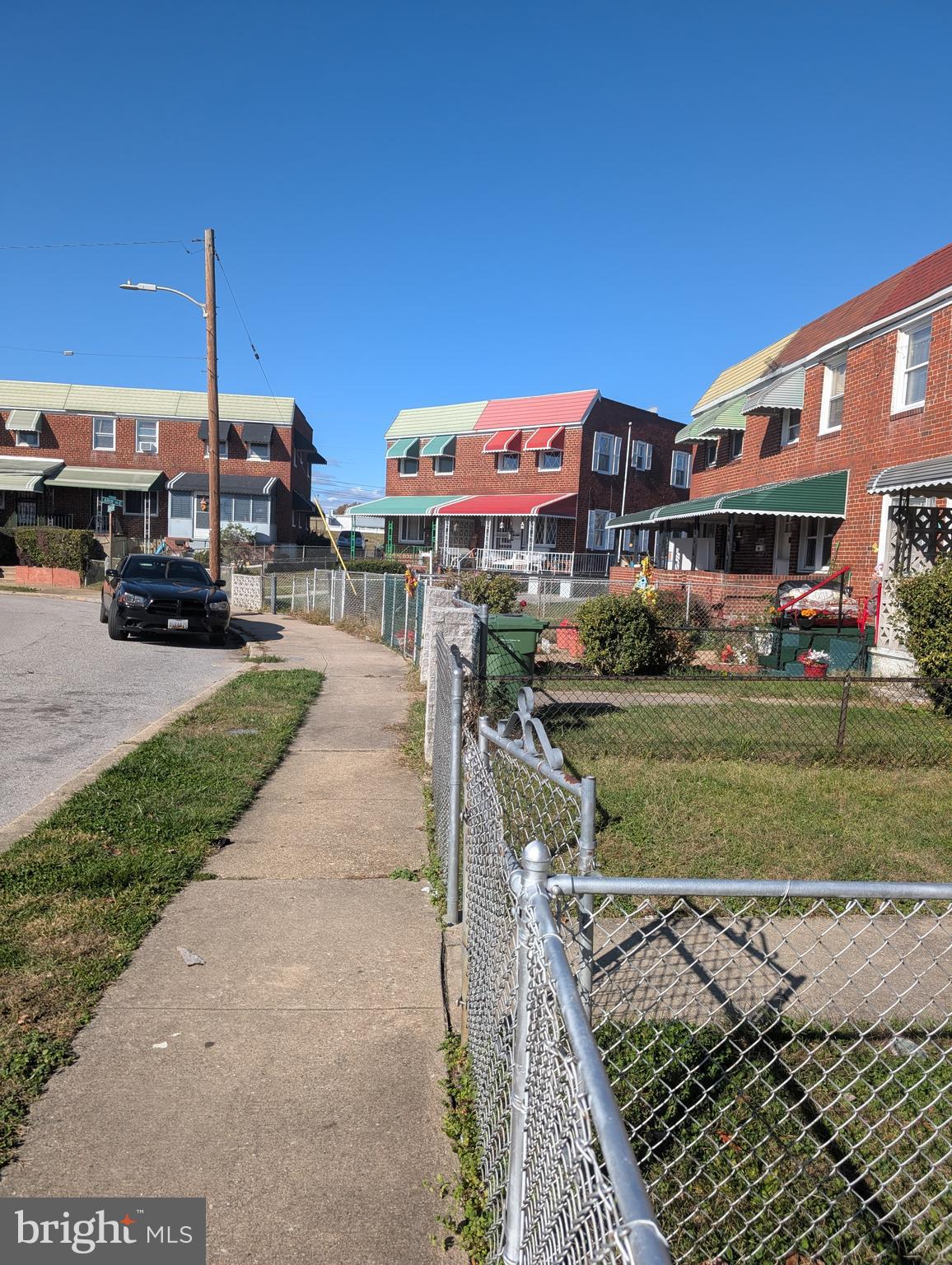 3011 Larue Square East Baltimore, MD 21225 - Photo 3 of 19 a view of a building with a yard