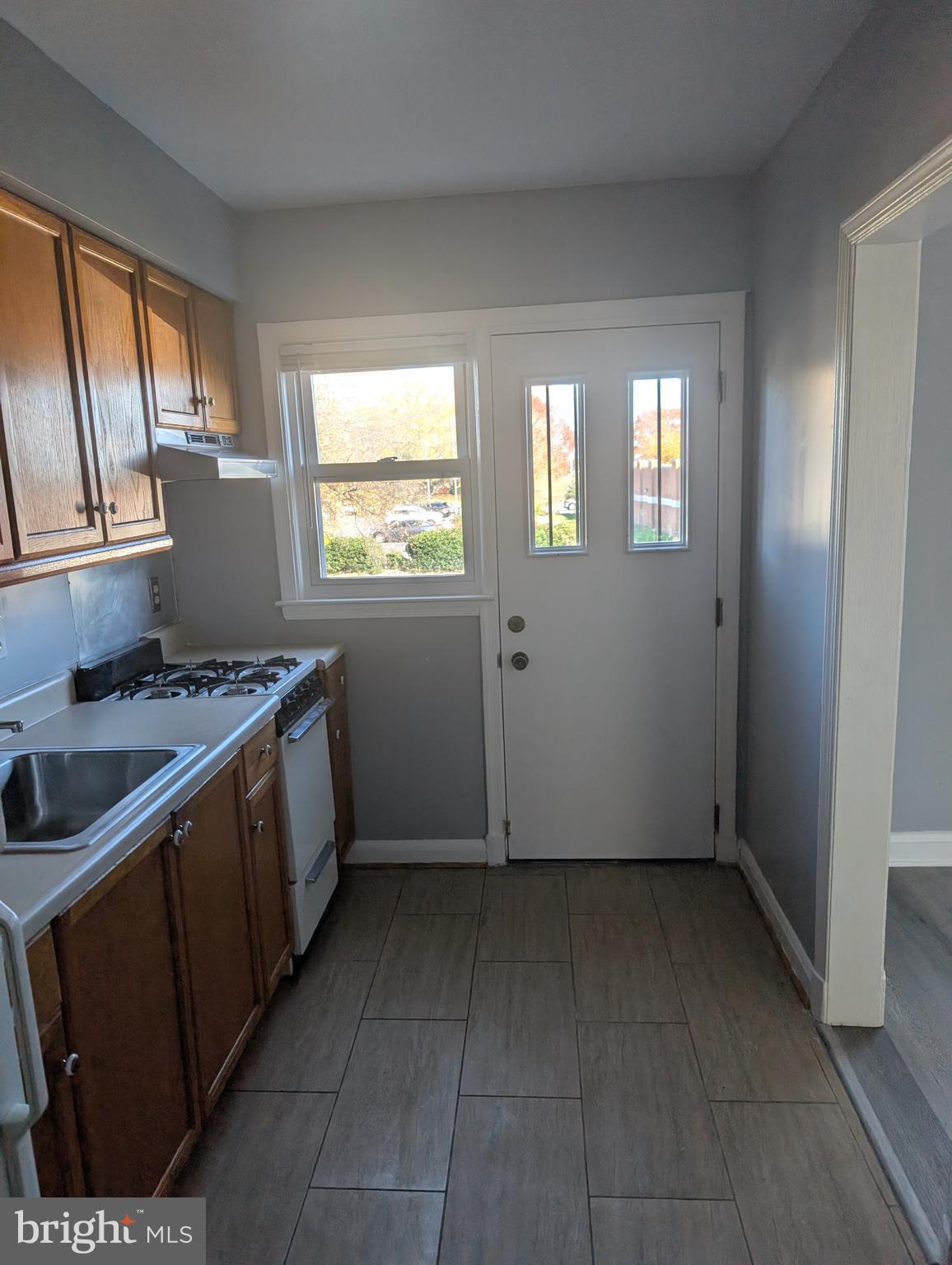3011 Larue Square East Baltimore, MD 21225 - Photo 7 of 19 an empty room with windows